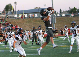 Tualatin football following lead of sophomore running back heading into league play