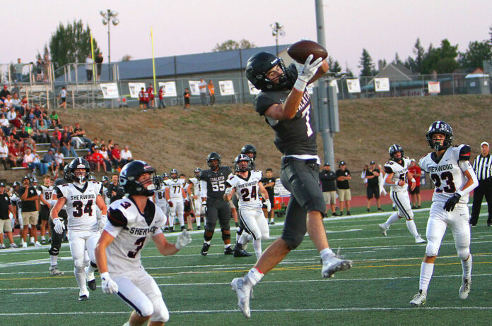 Tualatins-Trent-Dearborn-goes-up-for-one-of-this-three-receiving-touchdowns-in-a-43-0-win-against-Sherwood
