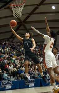 Tualatin's Jemai Lake scored a game-high 27 points in the state title win.