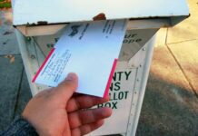 Supreme Court skeptical of allowing states to count mail ballots that arrive after Election Day An Oregonian slides their completed ballot into a secure return box, a fixture of the state's all-mail voting system for over 25 years.