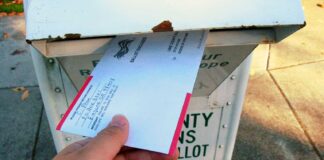 Supreme Court skeptical of allowing states to count mail ballots that arrive after Election Day An Oregonian slides their completed ballot into a secure return box, a fixture of the state's all-mail voting system for over 25 years.