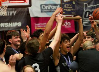 Tualatin boys cap improbable comeback to win state title The Tualatin boys basketball team celebrates after winning the state title thanks to a crazy finish that saw the Timberwolves hit two threes in the last nine seconds.