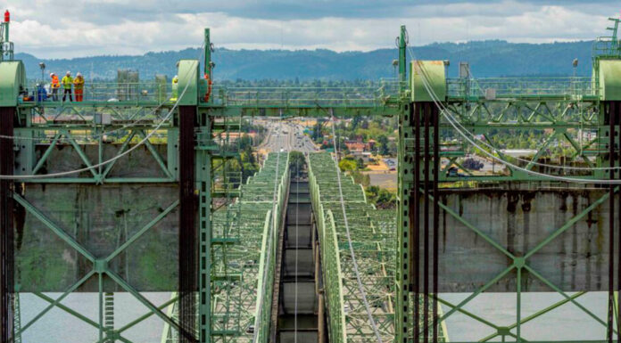 WA and Oregon scale back I-5 bridge ambitions as cost balloons to $14.4B Crews work on the Interstate 5 bridge over the Columbia River in 2019. (Oregon Department of Transportation)