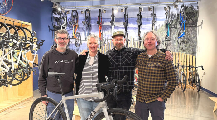 New Tualatin Bike/Coffee Shop combines riding and roasting Business partners Joe Holcomb and Stacey Daley stand alongside Service Manager Kurt Eisley and business partner Ken McClenahan.