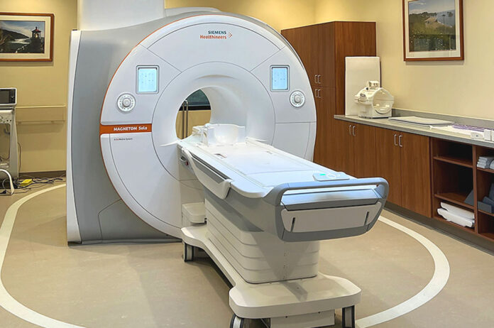 Installing the new MRI: A TMS9000-2 crane utilizing a 169-foot boom and 36,000 pounds of counterweight was required to maneuver the scanner’s 8,779-pound magnet into the medical center.