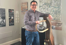 Tualatin Historical Society President Reflects After Retirement Ross Baker stands with Oregon pioneer George Saum’s yoke at the Tualatin Heritage Center on March 17, 2026.