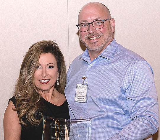 Titanium Partner of the Year: Mark Derbyshire (right) Landmark Ford