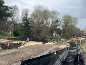 Nutter Corporation crews work on the final stretch of the Nyberg Creek Trail on March 17.
