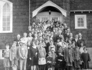Congregation gathers on front steps for the 1926 dedication day photo.