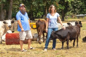 Jeff and Lory Jensen on their four acre farm along the Tualatin River.