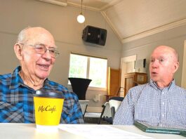 Tualatin Historical Society Celebrates 100 Years of Heritage Center Building Norm Parker (left) and Larry McClure discuss the history of the Tualatin Heritage building, which used to be a Methodist Church, with Tualatin Life.