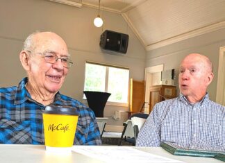 Tualatin Historical Society Celebrates 100 Years of Heritage Center Building Norm Parker (left) and Larry McClure discuss the history of the Tualatin Heritage building, which used to be a Methodist Church, with Tualatin Life.