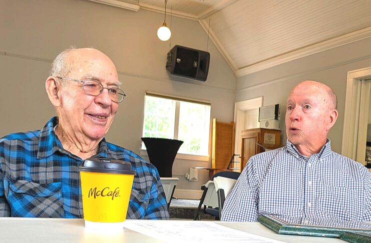 Tualatin Historical Society Celebrates 100 Years of Heritage Center Building Norm Parker (left) and Larry McClure discuss the history of the Tualatin Heritage building, which used to be a Methodist Church, with Tualatin Life.