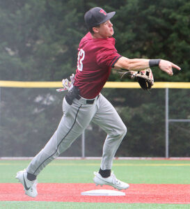 Tualatin infielder Owen Hagerman whips a throw across the field.