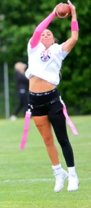Tualatin senior Isabella Hernandez leaps for a grab in a playoff win.