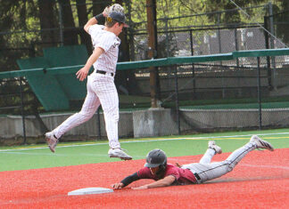 Highly-ranked Tualatin baseball, softball teams cruise into league play Tualatin's Hayden Camacho slides into second for a stolen base.