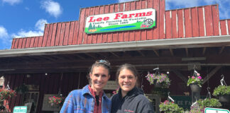 Tualatin Farms Divided on State Farm Store Bill Lee Farm Teagan Lee Milera and Annie Lee standing in front of Lee Farms on April 16, 2026.