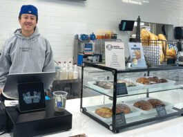 Tualatin Vietnamese Bakery has Menu Made of Family Recipes Baguette Bros owner Austin Chen stands behind the register on May 20, 2026. Chen said that the bakery has already established a healthy batch of regulars.