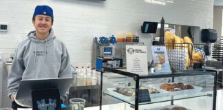 Tualatin Vietnamese Bakery has Menu Made of Family Recipes Baguette Bros owner Austin Chen stands behind the register on May 20, 2026. Chen said that the bakery has already established a healthy batch of regulars.