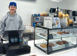 Tualatin Vietnamese Bakery has Menu Made of Family Recipes Baguette Bros owner Austin Chen stands behind the register on May 20, 2026. Chen said that the bakery has already established a healthy batch of regulars.