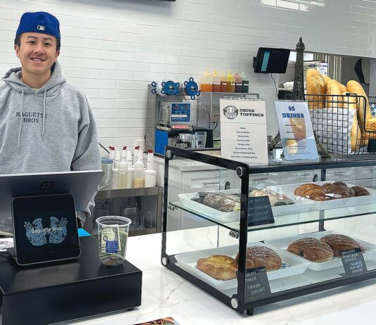 Tualatin Vietnamese Bakery has Menu Made of Family Recipes Baguette Bros owner Austin Chen stands behind the register on May 20, 2026. Chen said that the bakery has already established a healthy batch of regulars.