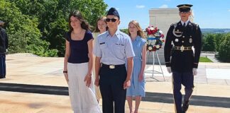 Teen from Tualatin Lays Wreath on Tomb of the Unknown Soldier Bo Pfeifer (center) presents a wreath to the Tomb of the Unknown Soldier at Arlington National Cemetery.