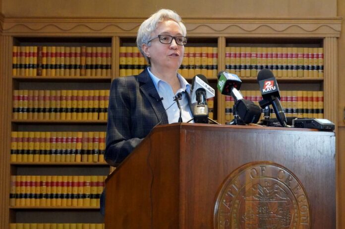 Governer-Kotek-talks-to-reporters Gov. Tina Kotek talks to reporters on Wednesday, Jan. 31, 2024, at an event to preview the legislative session. The governor and lawmakers plan to prioritize the state’s homelessness and drug addiction crises during the 2024 session.