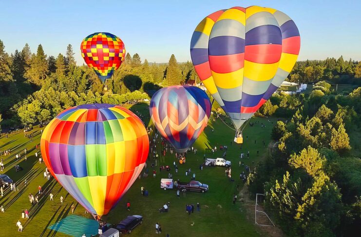 Tigard Festival of Balloons Returns June 26–28 with Theme “Growing Our Legacy” Hot air balloons in the sky at Tigard Festival of Balloons