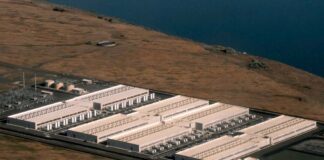 Data centers are driving demand for gas from Northwest utilities, reports find An explosion of data center facilities, including the one pictured here in Umatilla County on May 18, 2026, have been built in Oregon along the Columbia River Gorge during the last few years. The boom has caused a more than 500% load growth for the Umatilla Electric Cooperative during the last decade, which has had to buy more gas and coal-powered electricity on the wholesale market to meet demand.