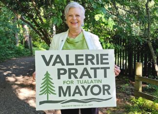 Why I Am Running for Mayor: A Letter to Tualatin Valerie Pratt holding "Valerie Pratt for Mayor" sign.