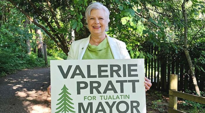 Why I Am Running for Mayor: A Letter to Tualatin Valerie Pratt holding "Valerie Pratt for Mayor" sign.