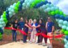 Ribbon Cutting Ceremony at Tualatin’s New Nyberg Creek Trail Tualatin City Councilor Valerie Pratt, surrounded by other key project planners like Tualatin East CIO President Doug Ulmer, cuts the ribbon at the Nyberg Creek Trail grand opening on Saturday, June 20.