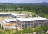 Tualatin Economy: “Doing Great” According to Industry Analysis An aerial view shows the Lam Research complex in Tualatin. High-tech manufacturing remains a primary economic driver for the city, accounting for nearly 5,000 local jobs and leading projected growth over the next decade.