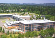Tualatin Economy: “Doing Great” According to Industry Analysis An aerial view shows the Lam Research complex in Tualatin. High-tech manufacturing remains a primary economic driver for the city, accounting for nearly 5,000 local jobs and leading projected growth over the next decade.