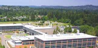 Tualatin Economy: “Doing Great” According to Industry Analysis An aerial view shows the Lam Research complex in Tualatin. High-tech manufacturing remains a primary economic driver for the city, accounting for nearly 5,000 local jobs and leading projected growth over the next decade.