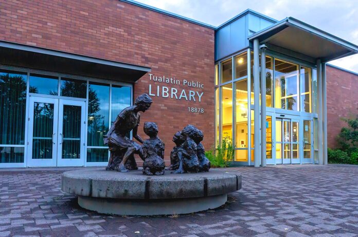 The Tualatin City Council voted 6-1 to approve a controversial intergovernmental library agreement to secure essential funding. However, city leaders blasted Washington County commissioners for eroding mutual trust through a forced, last-minute rollout