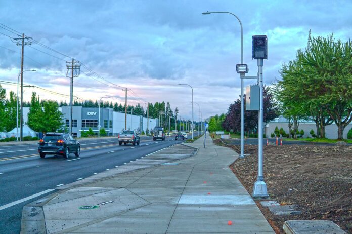 Tualatin-Red-Light-Camera Back online: One of four automated traffic cameras at SW Tualatin-Sherwood Road and SW Avery Street. The city resumed issuing citations at the intersection on July 9.