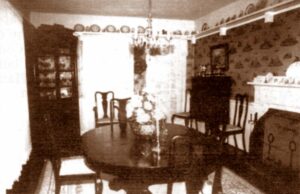 The dining room table belonged to the Sweek family.