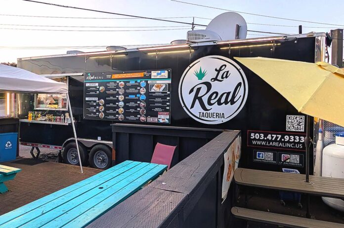 181-Food-Carts-La-Real Erick Sanchez, owner of La Real Taqueria, said that he’d consider relocating his food cart to Tualatin, if the planning commission’s pod plan was approved by city council.