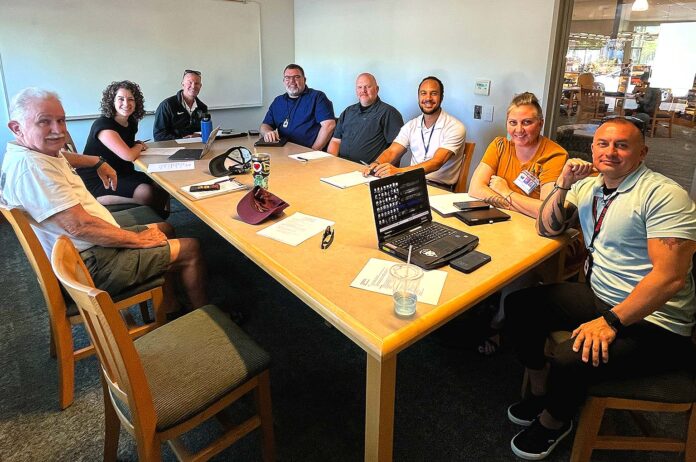 E-Safety-Colalition E-Safety Coalition members, from left to right: Danny O’Neal, Beth Dittman, TTSD School Resource Officer Brian Miller, Tualatin Police Captain Eric French, Tualatin Patrol Sergeant James Wall, TTSD Safe Routes Coordinator Dan Keller, Injury Prevention Program Supervisor at Randall Children’s Hospital Amber Kroeker and TTSD School Resource Officer Daniel Hernandez.