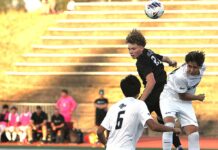 Veteran boys soccer team looks to rebound this year Rowan Hampson leaps for a header in Tualatin’s scoreless tie against Mountainside to open the season.