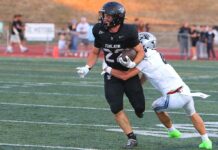 Tualatin football looks to bounce back after early playoff exit Tualatin junior Iden Rule helepd the Timberwolves offense get going after a slow start en route to a 52-13 win to kick off the season.