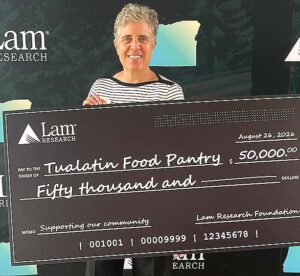Kathleen Sullivan, fundraising manager at the Tualatin Food Pantry, received a check for ,000 from Lam Research and told Tualatin Life, "we asked them for ,000 and they gave us ,000.