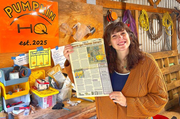 Alia-Martin-holding-Tualatin-Life-Pumpkin-Growing-article Martin holds up a copy of the Tualatin Life article that inspired her to participate in the West Coast Giant Pumpkin Regatta on Sept. 24, 2026.