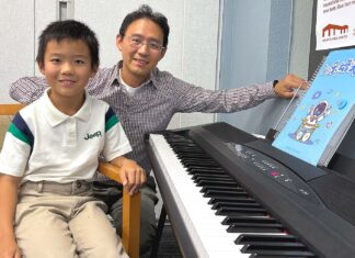 8-Year-Old Pianist Puts on Monthly Concerts at Juanita Pohl Center Andrew Gong and his father Patrick Gong both pose by the piano after Andrew Gong’s performance at the Juanita Pohl Center.