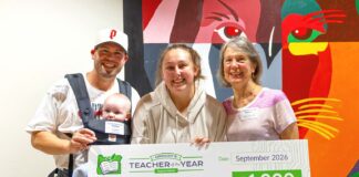 Tualatin High educator named Regional Teacher of the Year Regional Teacher of the Year Jennifer Mills (center) celebrates her $1,000 prize alongside her husband, Garrett, and son, Cal (left), and her mom, Juliann Williams, (right). Mills, an educator at Tualatin High School, advances to compete for the Oregon Teacher of the Year honor later this fall.