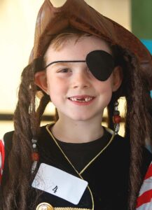 Kid in pirate costume