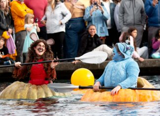 Giant Pumpkins Set Sail at Tualatin’s West Coast Giant Pumpkin Regatta Two participants in their giant pumpkins.
