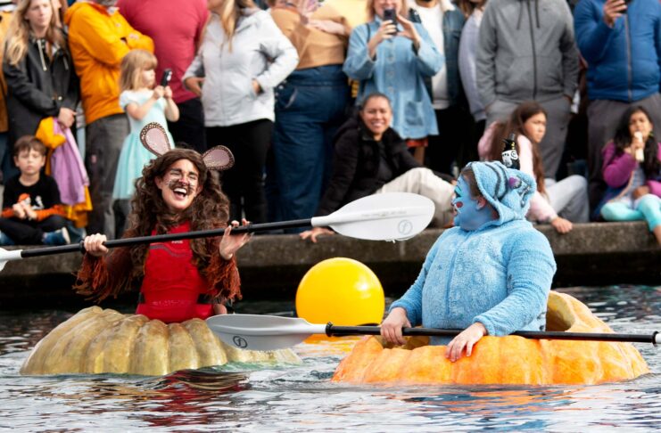 Giant Pumpkins Set Sail at Tualatin’s West Coast Giant Pumpkin Regatta Two participants in their giant pumpkins.