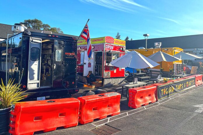 food-cart-tap-and-table The Tap & Table food cart pod in Tualatin’s neighbor city, Tigard consists of four carts and provides patrons with permanent bathrooms and shaded seating.